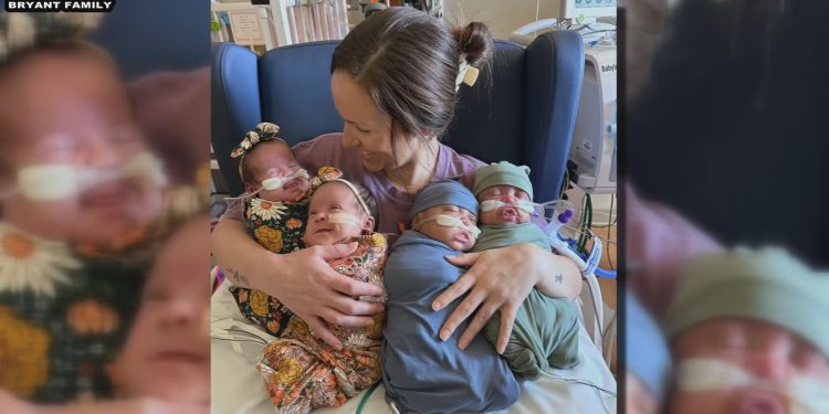 크리스마스 앞두고 어번 네 쌍둥이 엄마 품에 안겨